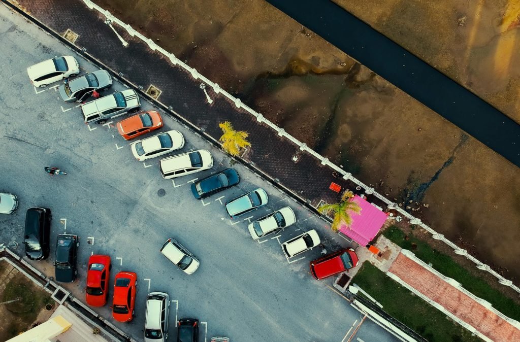 bird s eye view of parked cars